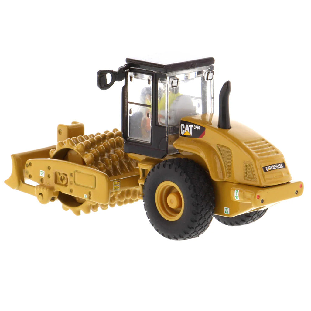 Model of a Caterpillar CP56 Padfoot Drum Vibratory Soil Compactor w/Enclosed Cab on a White Background