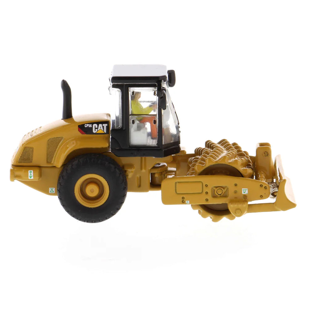 Model of a Caterpillar CP56 Padfoot Drum Vibratory Soil Compactor w/Enclosed Cab on a White Background