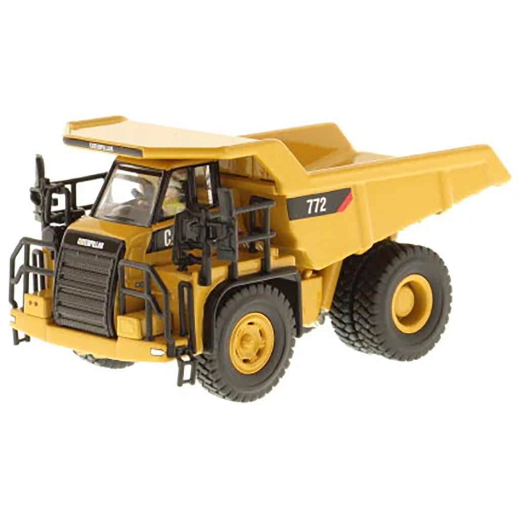 Model of a Caterpillar 772 Off-Highway Dump Truck on a White Background
