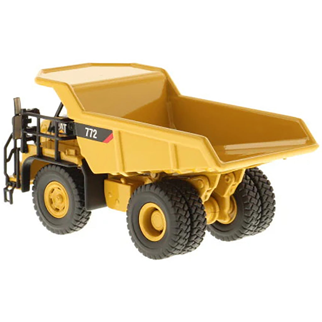 Model of a Caterpillar 772 Off-Highway Dump Truck on a White Background
