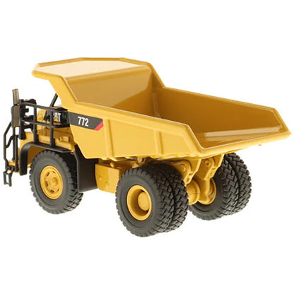 Model of a Caterpillar 772 Off-Highway Dump Truck on a White Background