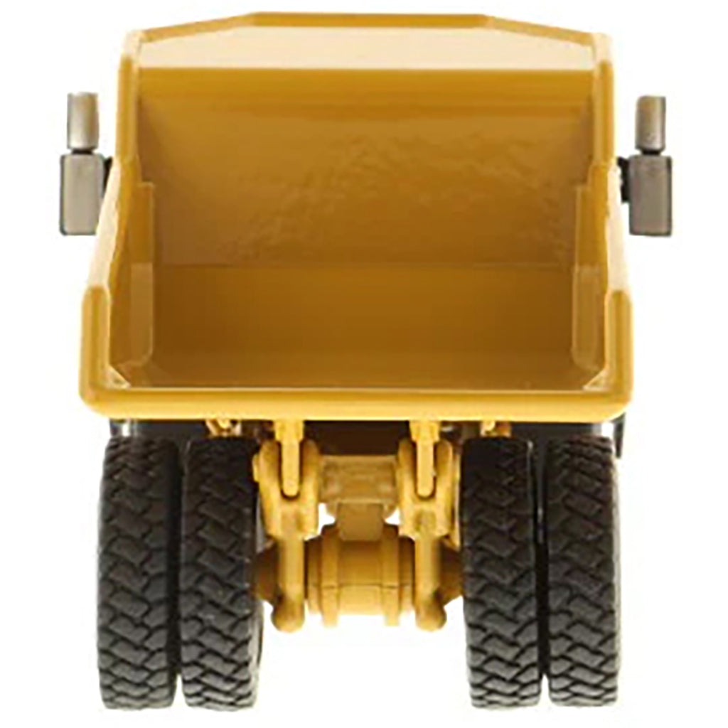 Model of a Caterpillar 772 Off-Highway Dump Truck on a White Background