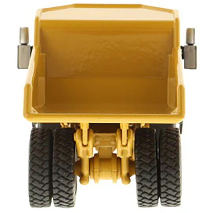 Model of a Caterpillar 772 Off-Highway Dump Truck on a White Background