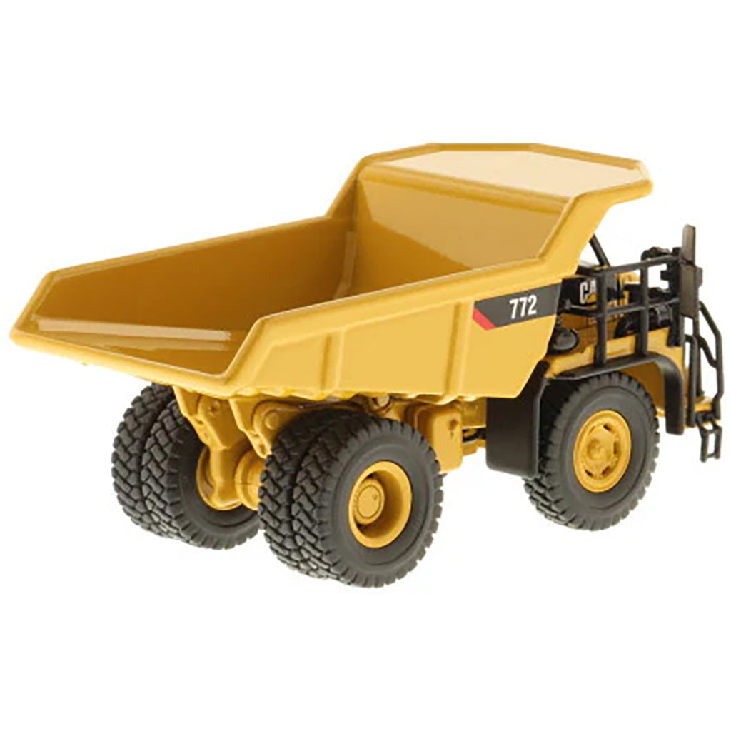 Model of a Caterpillar 772 Off-Highway Dump Truck on a White Background
