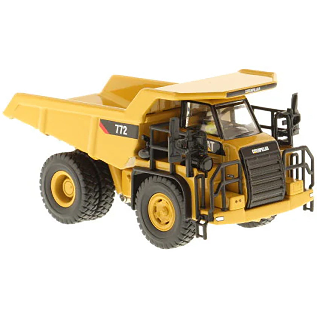 Model of a Caterpillar 772 Off-Highway Dump Truck on a White Background