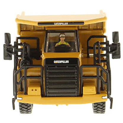 Model of a Caterpillar 772 Off-Highway Dump Truck on a White Background