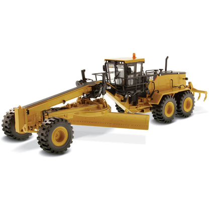 Model of a Caterpillar 24M Road Grader on a White Background