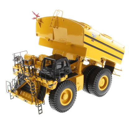 Model of a Caterpillar MWT30 Mega Mining Water Tank Truck on a White Background