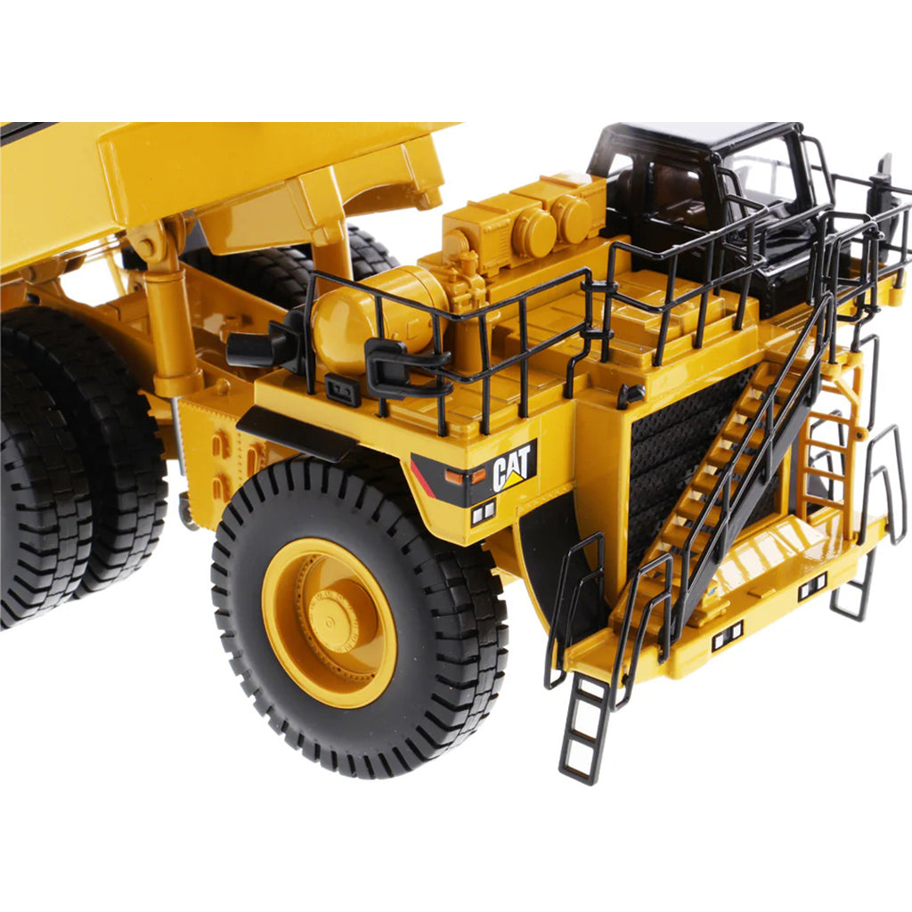 Model of a Caterpillar MWT30 Mega Mining Water Tank Truck on a White Background