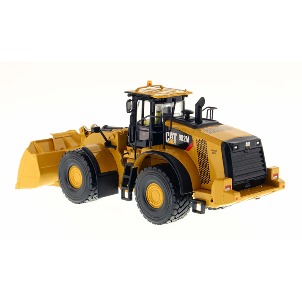 Model of a Caterpillar 982M Wheel Loader on a White Background