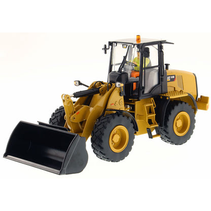 Model of a Caterpillar 910K Wheel Loader on a White Background