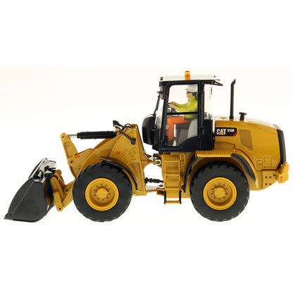 Model of a Caterpillar 910K Wheel Loader on a White Background