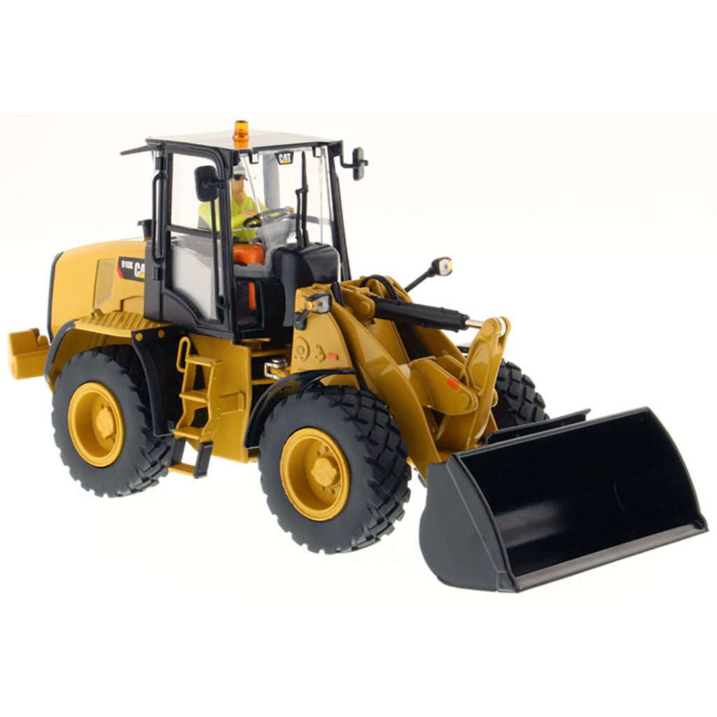 Model of a Caterpillar 910K Wheel Loader on a White Background