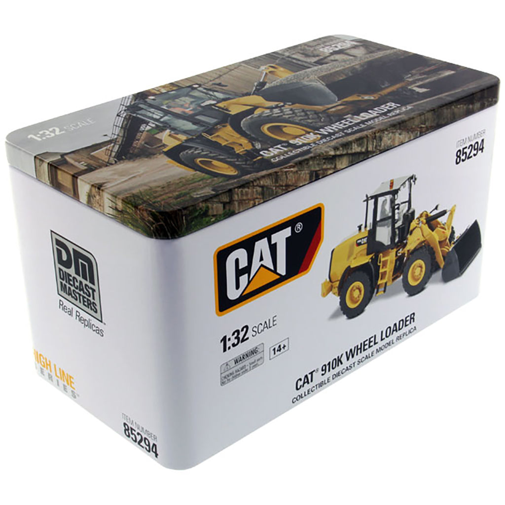 Model of a Caterpillar 910K Wheel Loader in a Tin Box Packaging on a White Background