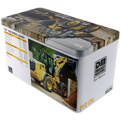 Model of a Caterpillar 910K Wheel Loader in a Tin Box Packaging on a White Background