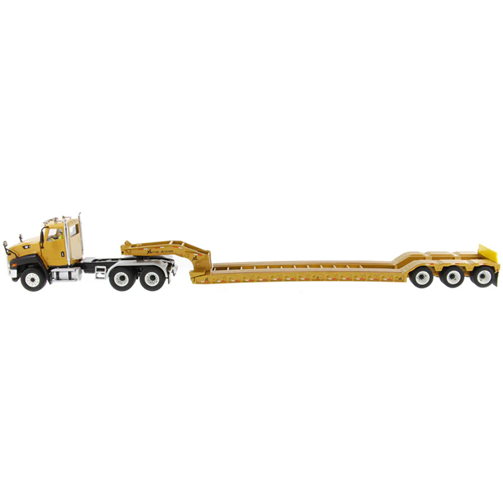 Model of a yellow low-loader truck on a white background