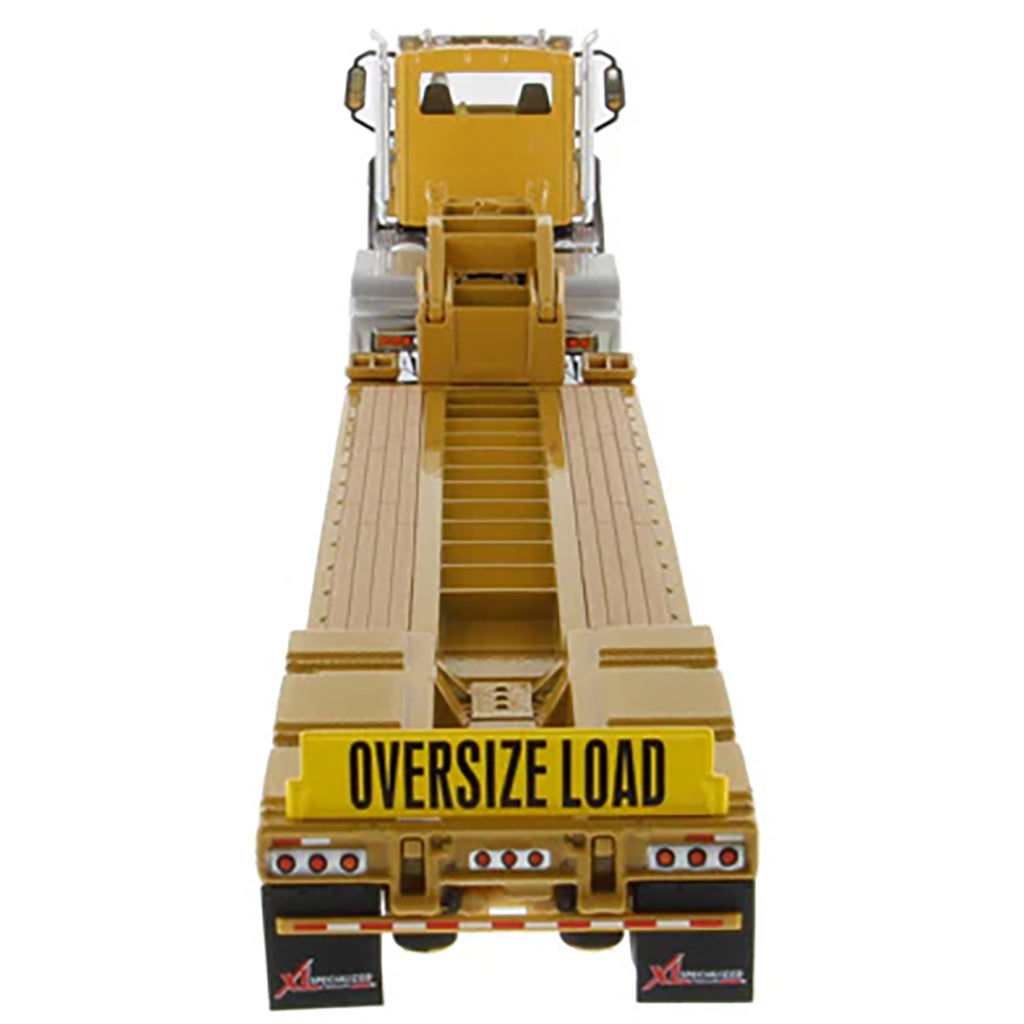 Model of a flatbed truck with an oversized load sign on a white background