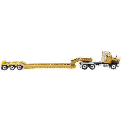 Model of a yellow tow truck with a flatbed on a white background