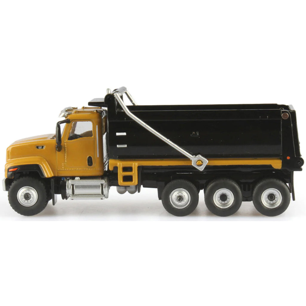 Model dump truck with yellow cab and black bed on a white background