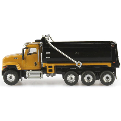 Model dump truck with yellow cab and black bed on a white background