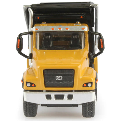 Model of a yellow dump truck with open back on a white background