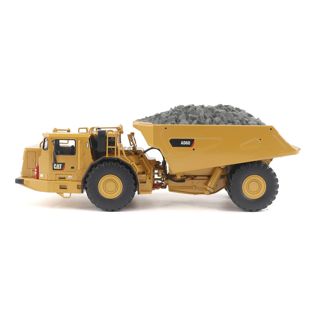 Model of a Caterpillar AD60 Underground Articulated Dump Truck on a White Background