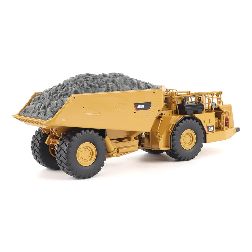 Model of a Caterpillar AD60 Underground Articulated Dump Truck on a White Background