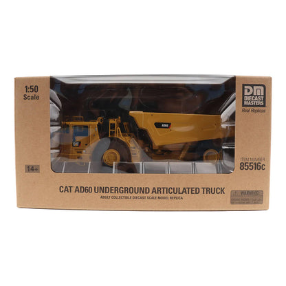 Boxed model of a CAT AD60 Underground Articulated Truck with Diecast Masters branding.