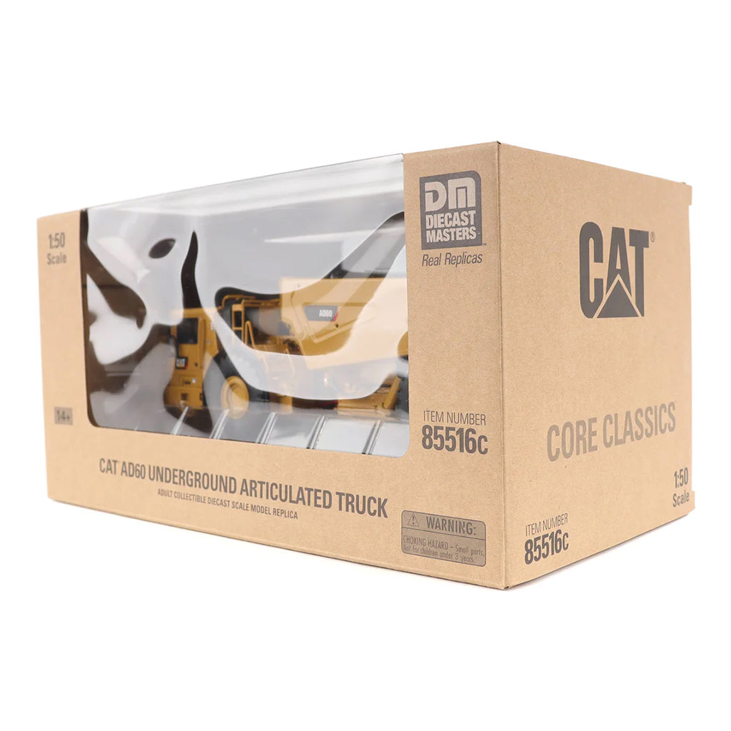 Boxed model of a CAT AD60 Underground Articulated Truck with Diecast Masters branding.