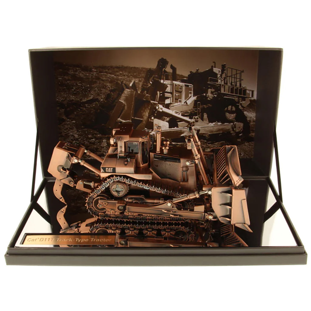 Model of a Caterpillar D11T Track-Type Dozer with Rear Ripper with a Copper Finish in its Packaging on a White Background