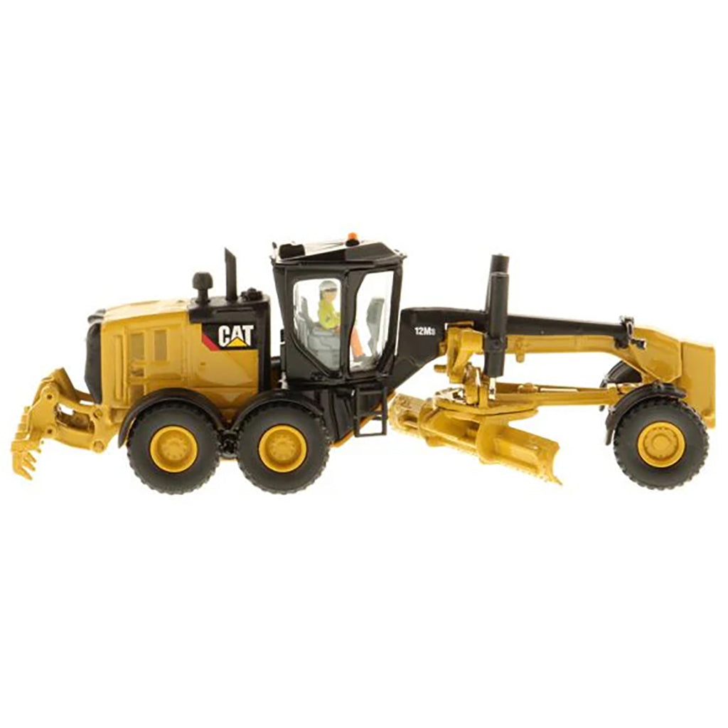 Model of a Caterpillar 12M3 Road Grader Construction Vehicle on a White Background