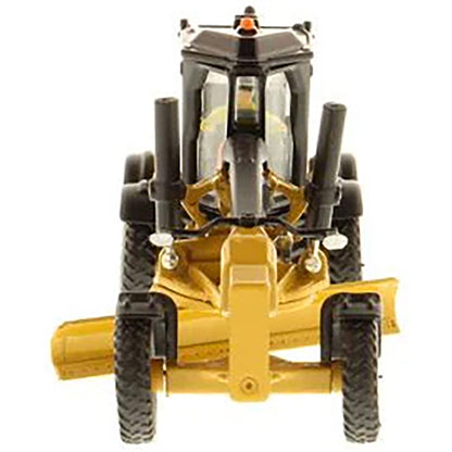 Model of a Caterpillar 12M3 Road Grader Construction Vehicle on a White Background