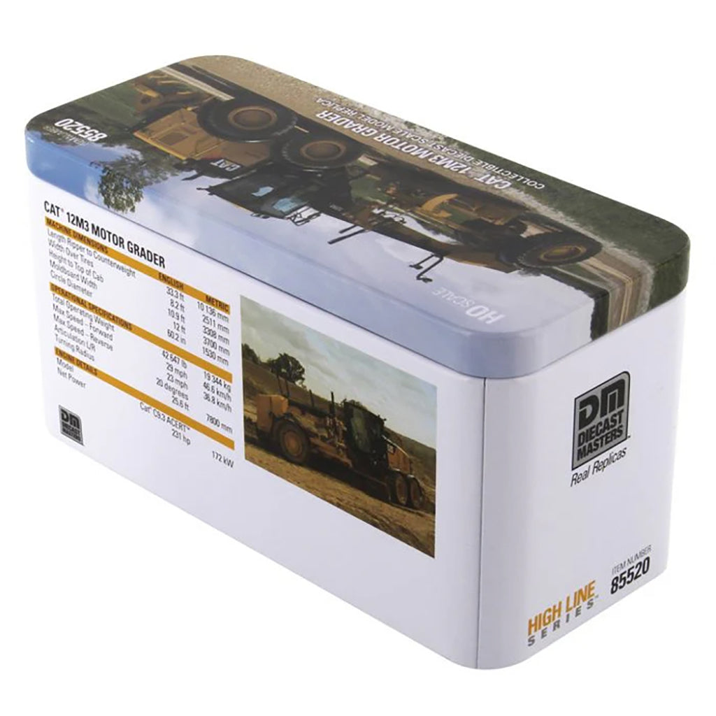Model of a Caterpillar 12M3 Road Grader Construction Vehicle in Tin Box Packaging on a White Background
