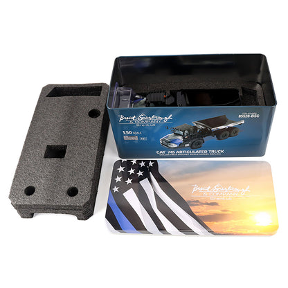 Model truck packaging with foam insert and promotional card featuring an American flag design.
