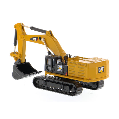 A yellow and black CAT toy excavator with a black bucket and tracks, shown on a clean white background.