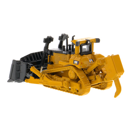 A yellow and black toy bulldozer model with a front blade and rear ripper attachment, photographed on a clean white background. The CAT logo is visible on the side.