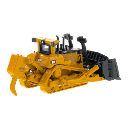 A yellow and black toy bulldozer model with a front blade and rear ripper attachment, photographed on a clean white background. The CAT logo is visible on the side.