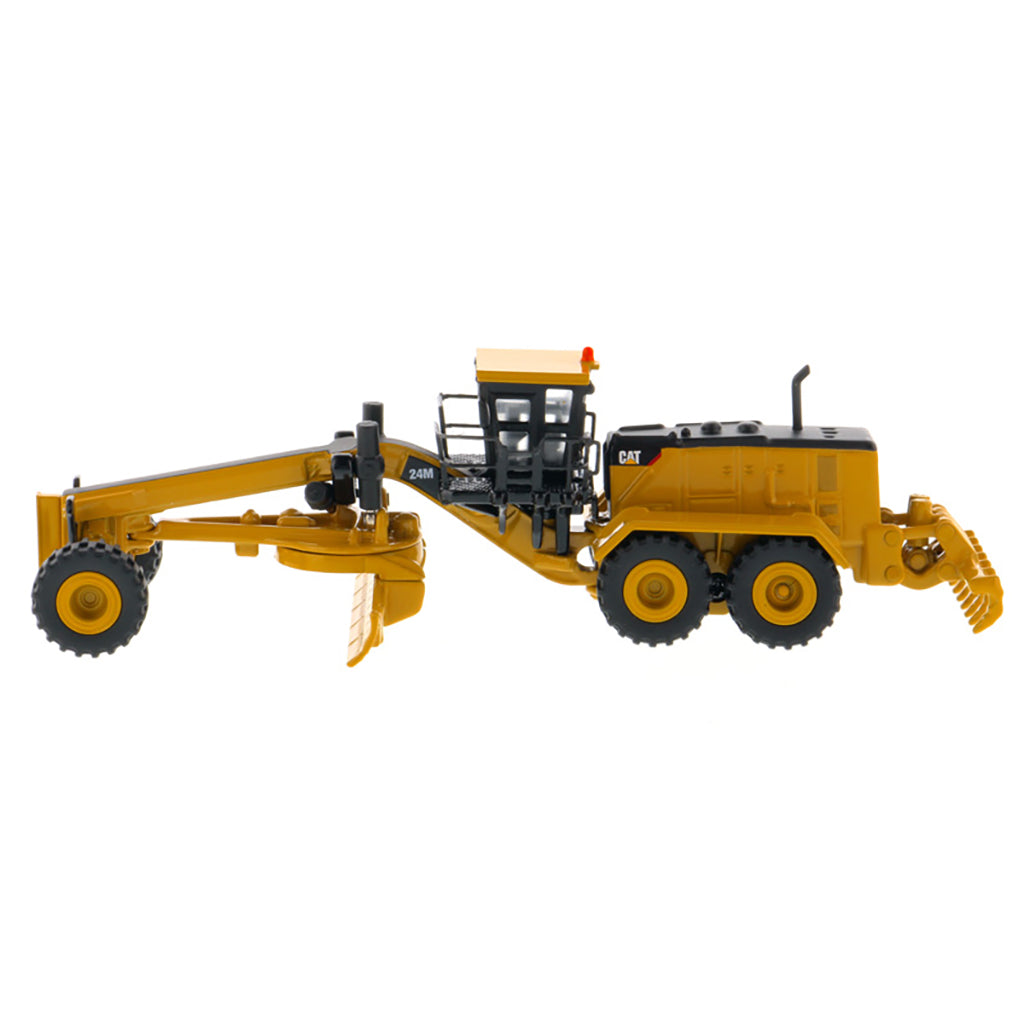 1:125 Scale Diecast Model of a Caterpillar 24M Motor Grader on a White Background