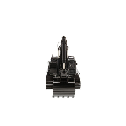 A metallic dark gray CAT excavator model shown at a three-quarter angle on a clean white background.
