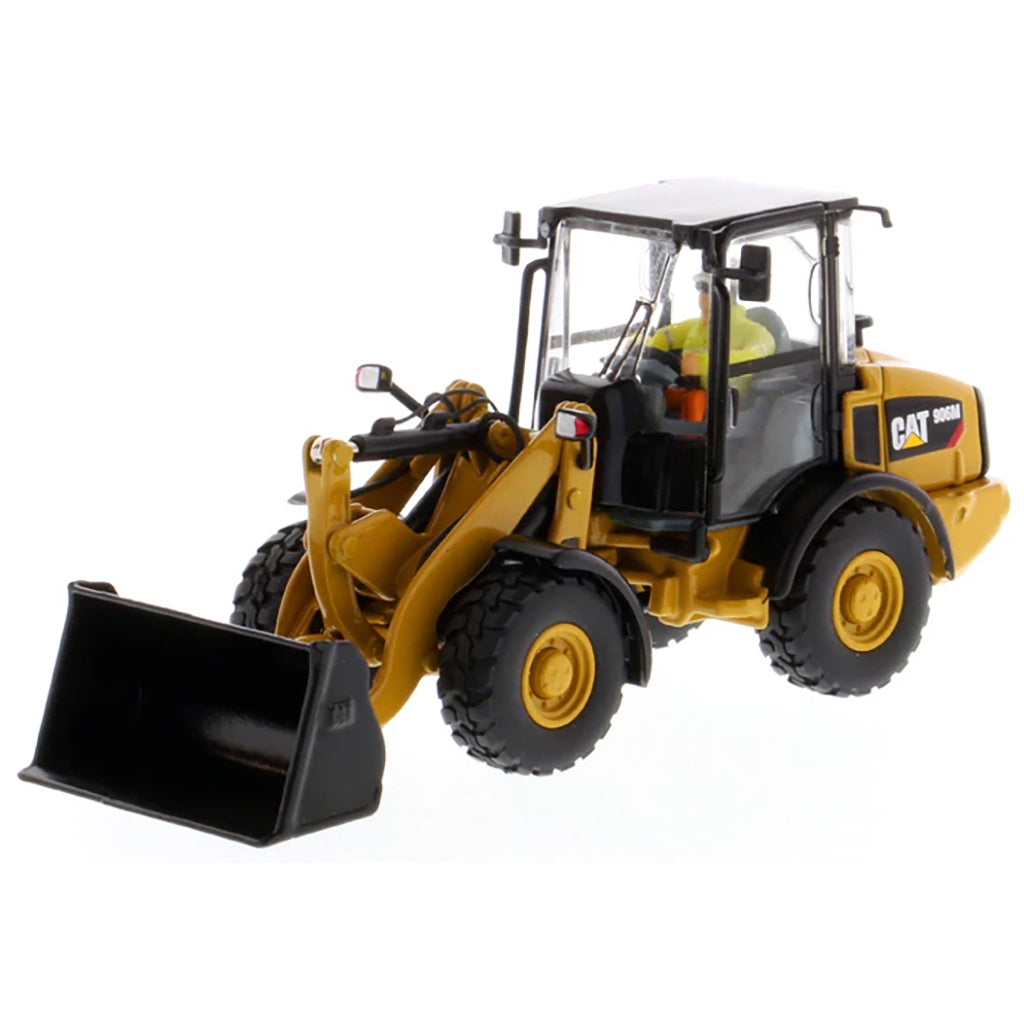 Model of a Caterpillar 906H Compact Wheel Loader on a White Background