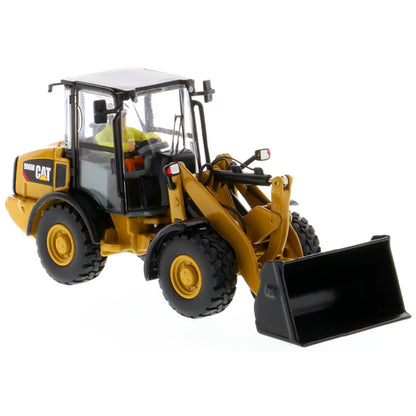 Model of a Caterpillar 906H Compact Wheel Loader on a White Background