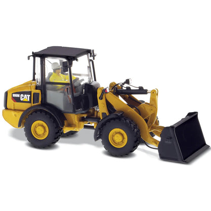 Model of a Caterpillar 906H Compact Wheel Loader on a White Background