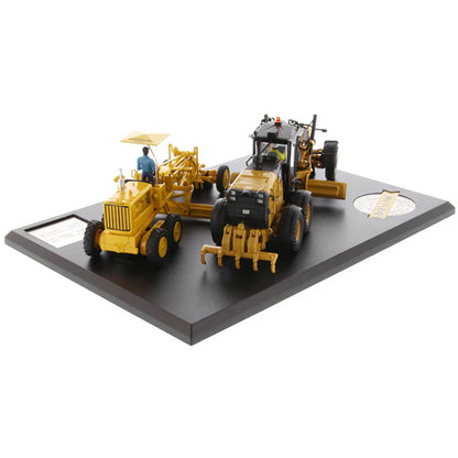 Models of 2 Different Caterpillar Road Graders, 1 Vintage Diesel No 12 Motor Grader and 1 Modern 12M3 Motor Grader Mounted to a Black Base on a White Background