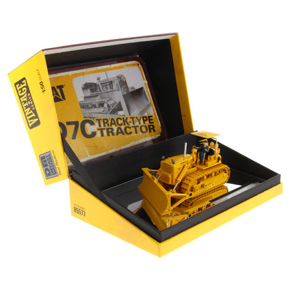 Model of a Caterpillar 7C track-type tractor in a yellow box with branding.