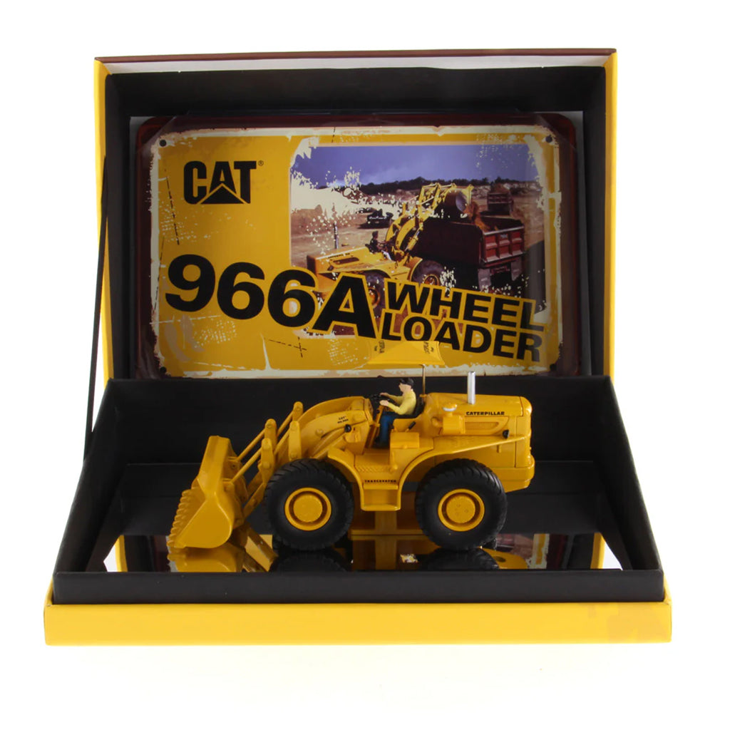 Model of a Yellow Caterpillar 966A Wheel Loader with Shade Umbrella on a White Background