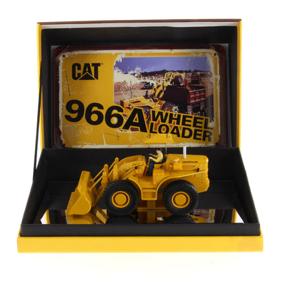 Model of a Yellow Caterpillar 966A Wheel Loader with Shade Umbrella on a White Background