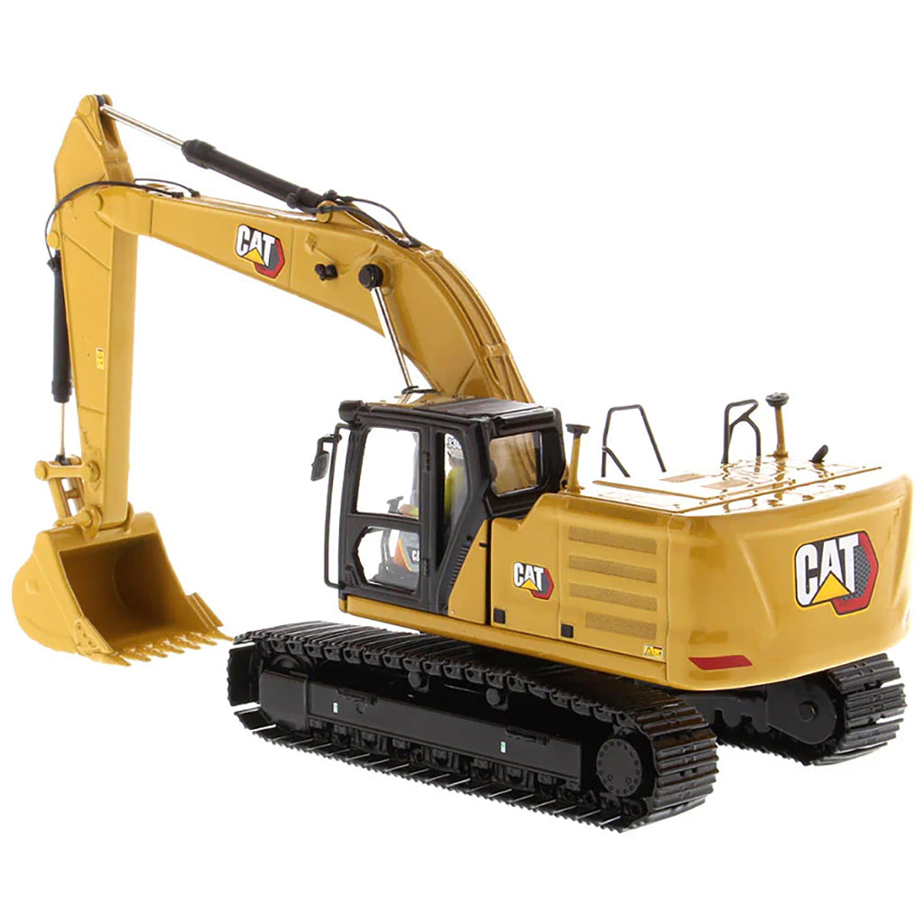 Model of a yellow Caterpillar excavator on a white background