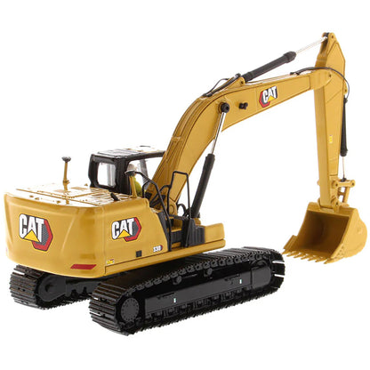 Toy excavator with CAT branding on a white background