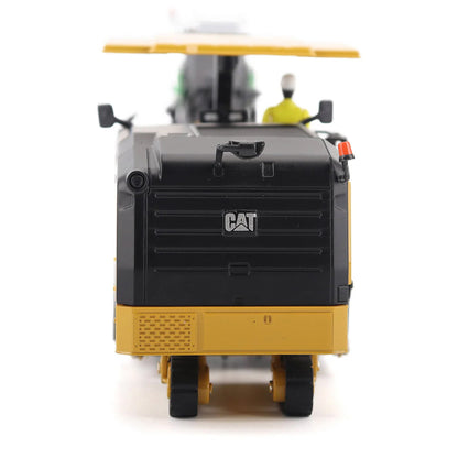 Model of a Caterpillar PM622 Cold Planer on a White Background