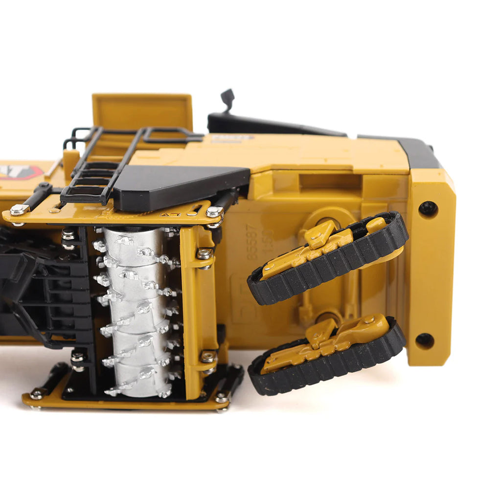 Model of a Caterpillar PM622 Cold Planer on a White Background